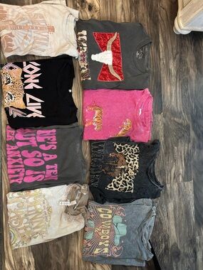 Graphic T bundle!! All punched through local boutiques. Size adult M-L